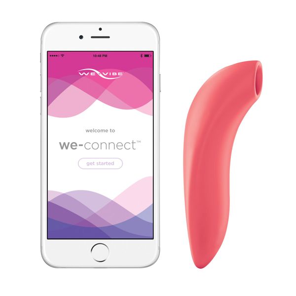 Vacuum smart stimulator for couples Melt by We-Vibe Coral, designed for use during penetrative sex