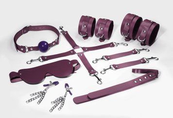 Feral Feelings BDSM Kit 7 Burgundy, handcuffs, leggings, connector, mask, paddle, gag, clamps