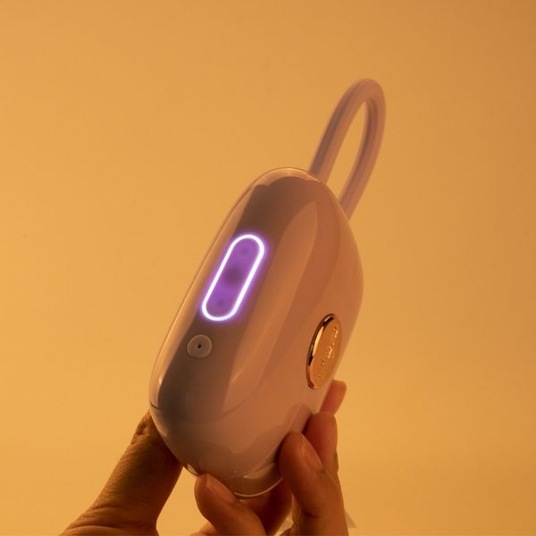 Purple Louis Vibrate Clitoral Vacuum Stimulator with Vibrating Egg by Otouch, in Case